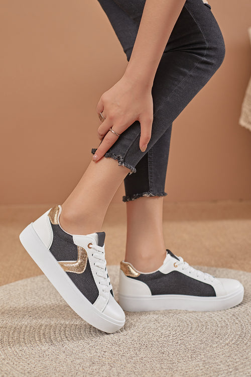 Basket noir et blanche avec details doré