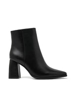 Bottines en noir à bout pointu et talon bloc